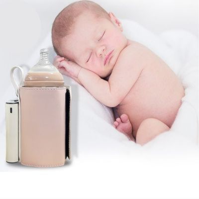 Bébé-dort-avec-meilleur-chauffe-biberon-nomade-polyvalent-rose