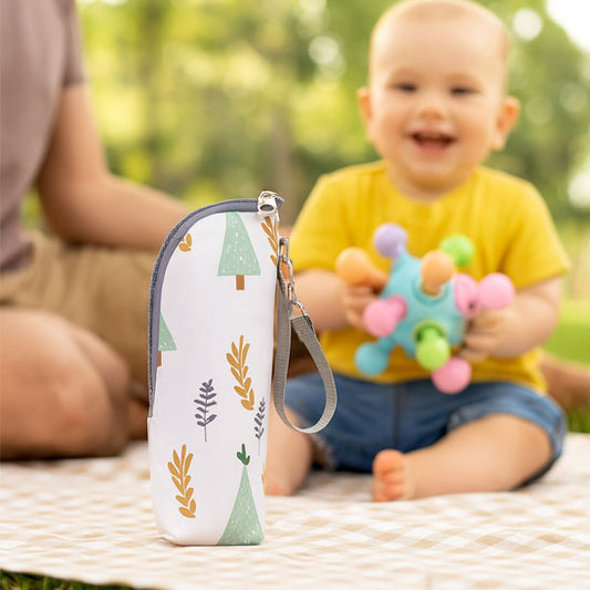 Bébé-heureux-avec-sac-isotherme-biberon-ultra-léger