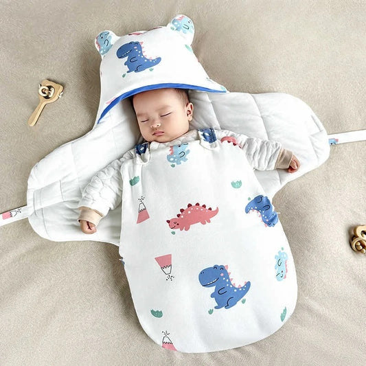 Enfant-dort-dans-nid-d_ange-cosy-dinosaure