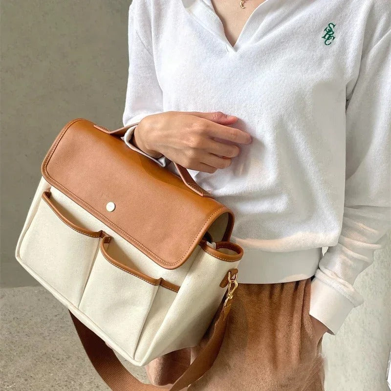 Femme-porte-au-bras-sac-à-langer-Tendance™