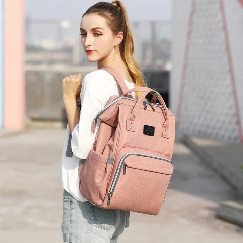Sac-à-dos-à-langer-convivial-rose