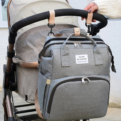Sac-à-dos-à-langer-voyage-plus-attache-poussette