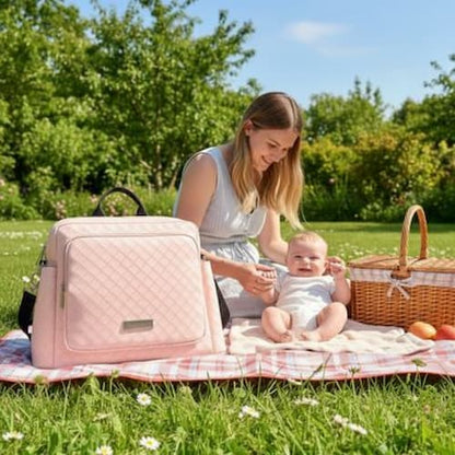 Sac a langer a dos élégant rose avec poupon au parc
