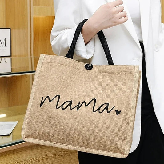 Femme-porte-sur-avant-bras-sac-à-langer-bébé-mama-léger