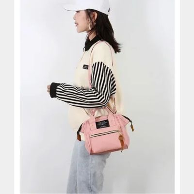 Sac-à-dos-à-langer-coquet-rose