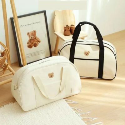 Deux-sac-à-langer-simplicité-blanc-et-noir