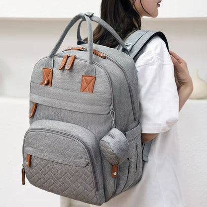 Femme-porte-sur-épaules-sac-à-dos-à-langer-multifonction