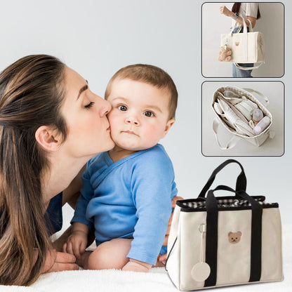 sac-à-langer-compact-léger-mère-embrasse-bébé